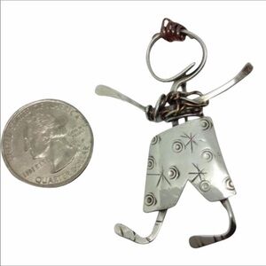 - Silver tone brooch (vintage)